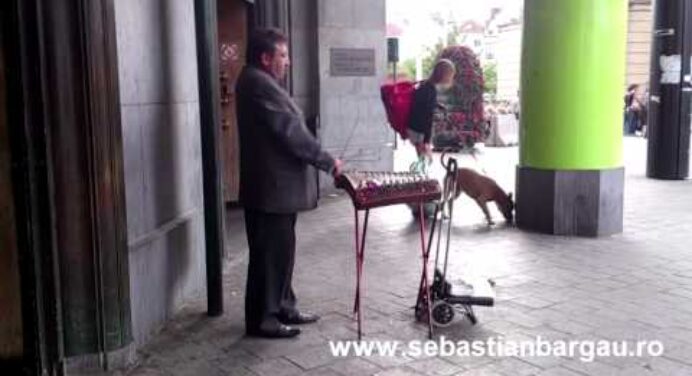 Ţigan muncind în Belgia